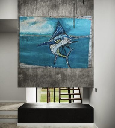 Colorful abstract painting of a marlin in blue tones displayed on a textured wall.